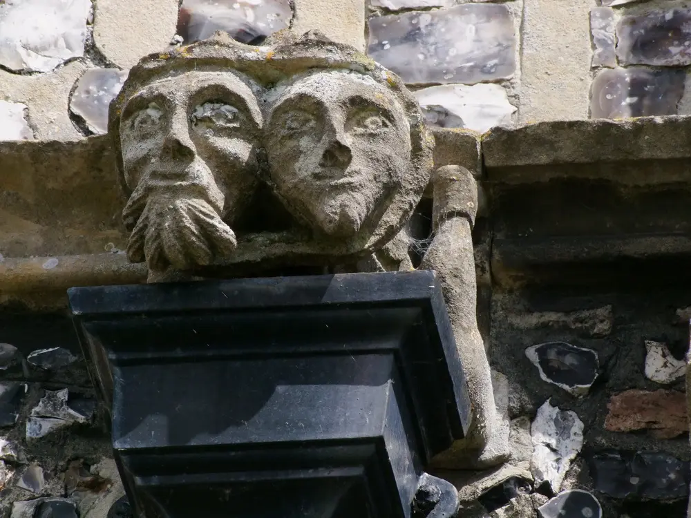 Father and son gargoyle at St Martin, Fincham, Norfolk